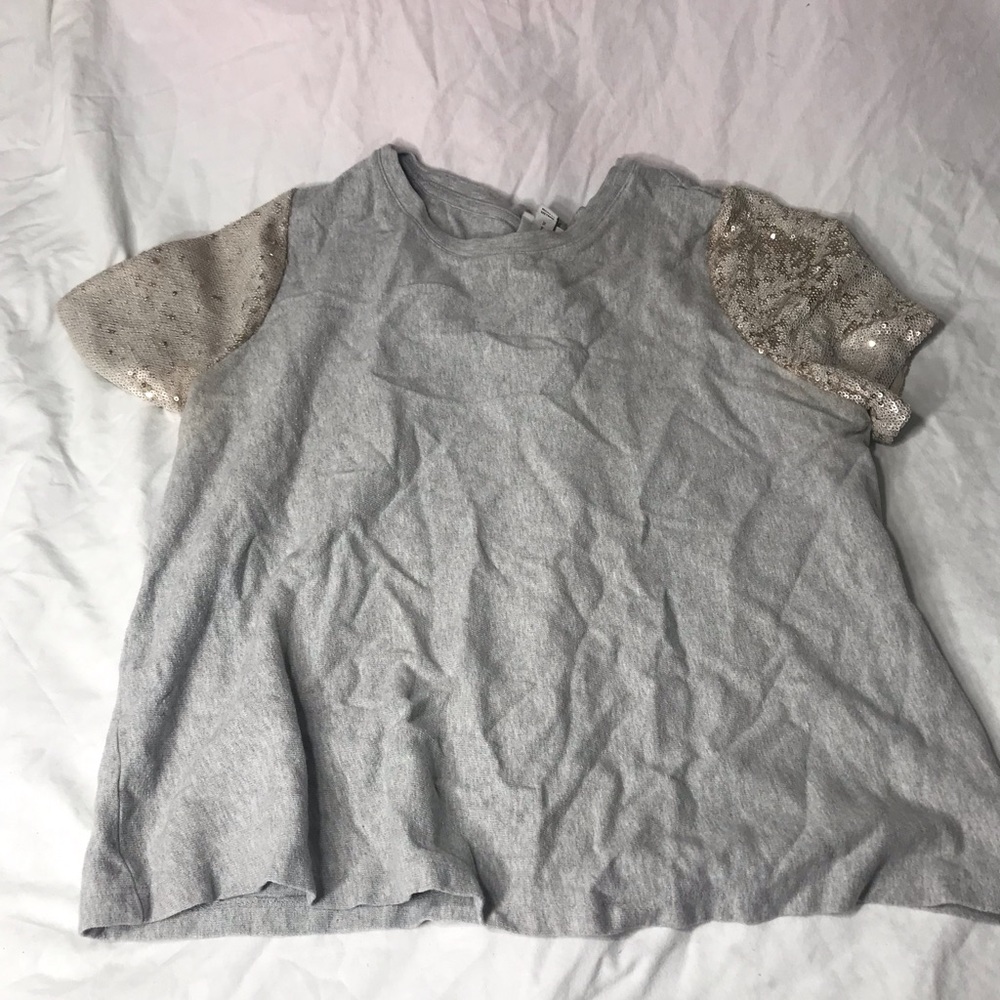 Gray sequins changing shirt